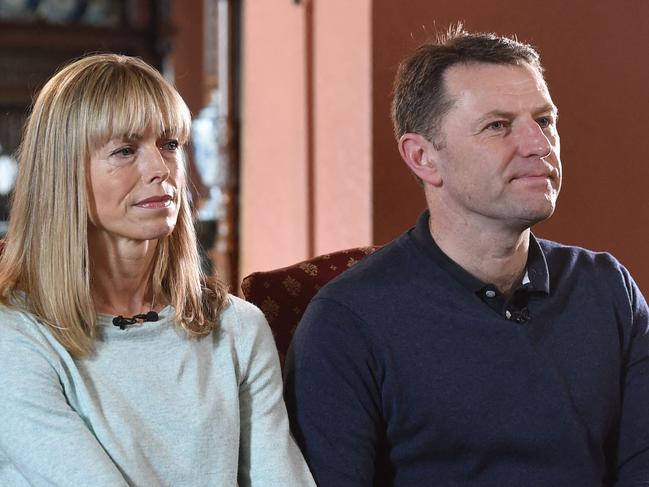 (FILES) In this file photo taken on April 28, 2017 Kate (L) and Gerry (R) McCann, whose daughter Madeleine disappeared from a holiday flat in Portugal in 2007, are seen during an interview with the BBC's Fiona Bruce at Prestwold Hall in Loughborough. - A man has been declared an official suspect in Germany at Portugal's request in connection with the disappearance of British girl Madeleine McCann nearly 15 years ago, a Portuguese prosecutor's office announced on April 22, 2022. Madeleine went missing from her family's holiday apartment in the Portuguese holiday resort of Praia da Luz on May 3, 2007, a few days before her fourth birthday, sparking a media frenzy and an unprecedented international manhunt. (Photo by Joe Giddens / POOL / AFP)