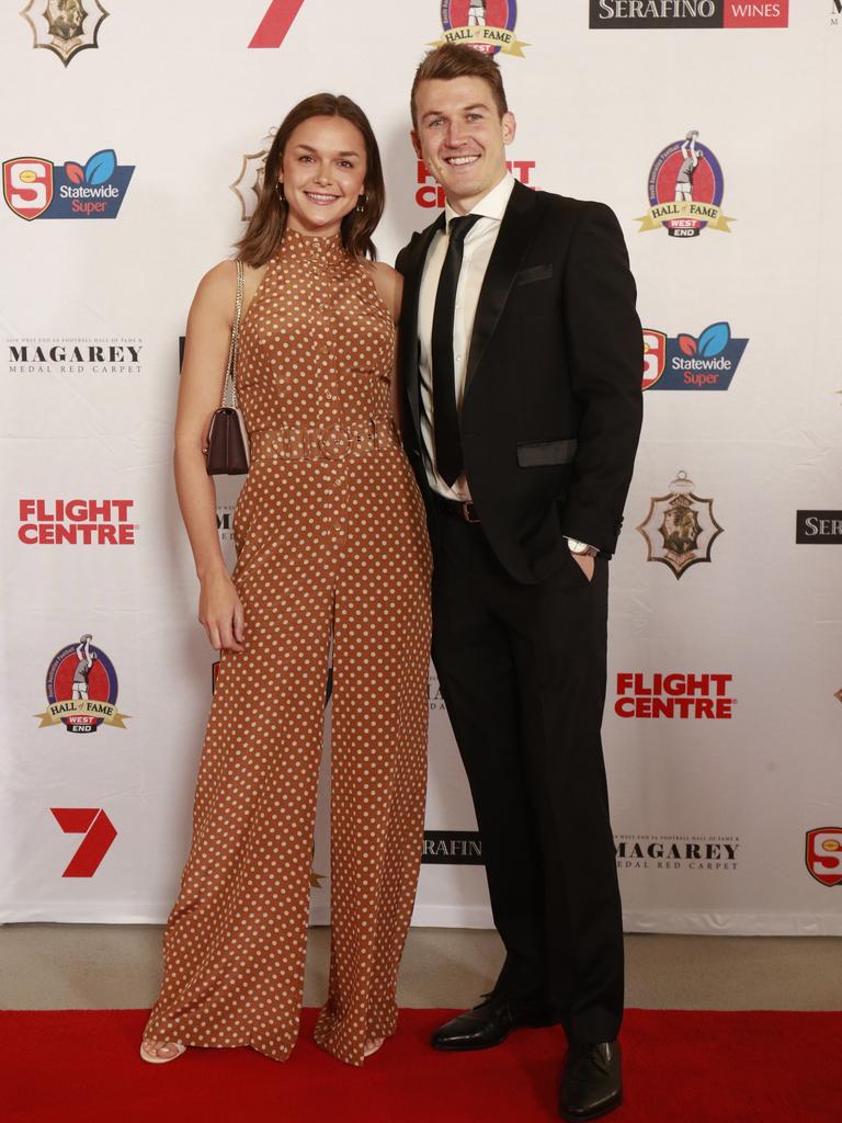 Sarah Clements and Jack Trengove pose for a picture on the red carpet at Adelaide Oval in North Adelaide, for the Magarey Medal, Monday, September 9, 2019. Picture: Matt Loxton