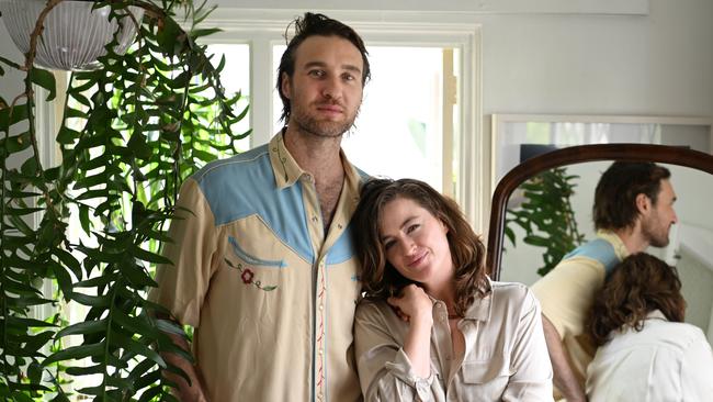 Singer-songwriter Megan Washington (right) with her filmmaker partner, Nick Waterman, at their home in Brisbane on Thursday May 5, after they were announced as the creative team behind a film adaptation of Paul Kelly's song How To Make Gravy. Picture: Lyndon Mechielsen