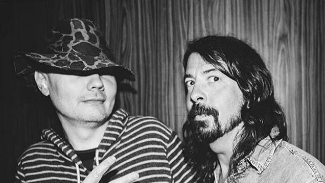 Dave Grohl (right) of the Foo Fighters is among some of the big names who have visited Frankie's Pizza. Picture: Frankie’s Pizza