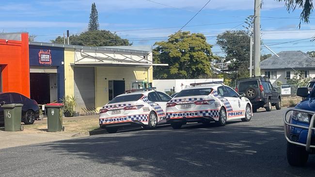 Emergency crews on scene at Wynnum workplace after a fall from a roof. Picture: Brayden Heslehurst