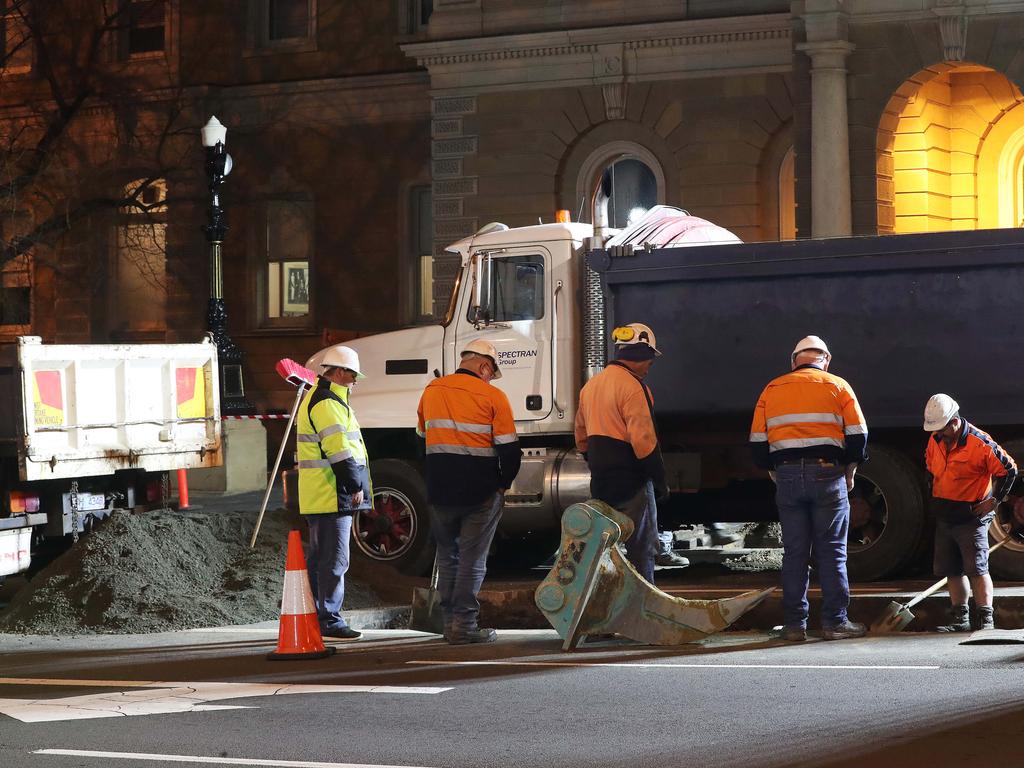 Work in Macquarie Street Hobart on the hole that will house the chamber performance artist Mike Parr will live in for 72 hours during Dark Mofo. Picture: NIKKI DAVIS-JONES