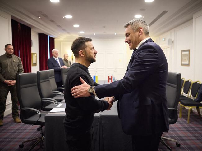 President of Ukraine Volodymyr Zelenskyy shakes hands with Federal Chancellor of Austria Karl Nehammer in Paris. Picture: AFP