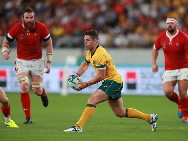 CHOFU, JAPAN - SEPTEMBER 29: Bernard Foley of Australia passes the ball during the Rugby World Cup 2019 Group D game between Australia and Wales at Tokyo Stadium on September 29, 2019 in Chofu, Tokyo, Japan. (Photo by David Rogers/Getty Images)