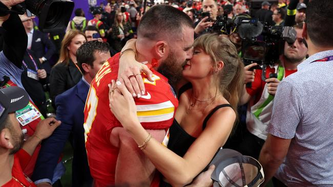 Travis Kelce shares a kiss with Taylor Swift after the Chiefs beat the San Francisco 49ers. Picture: Getty Images