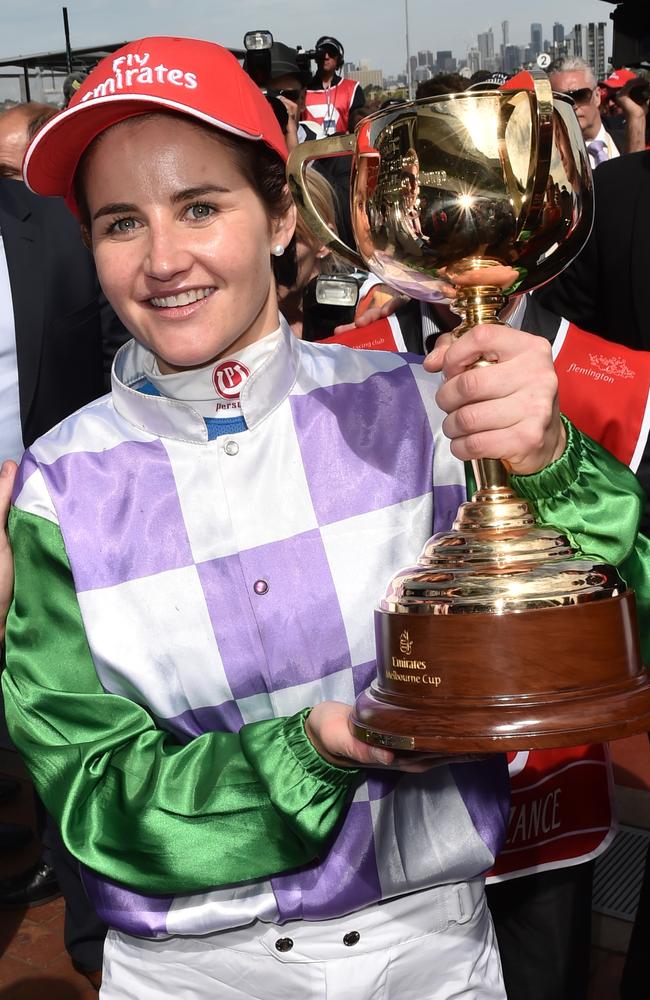 Michelle Payne celebrates after winning the Melbourne Cup on Prince of Penzance at Flemington Racecourse in Melbourne in 2015. Picture: Julian Smith