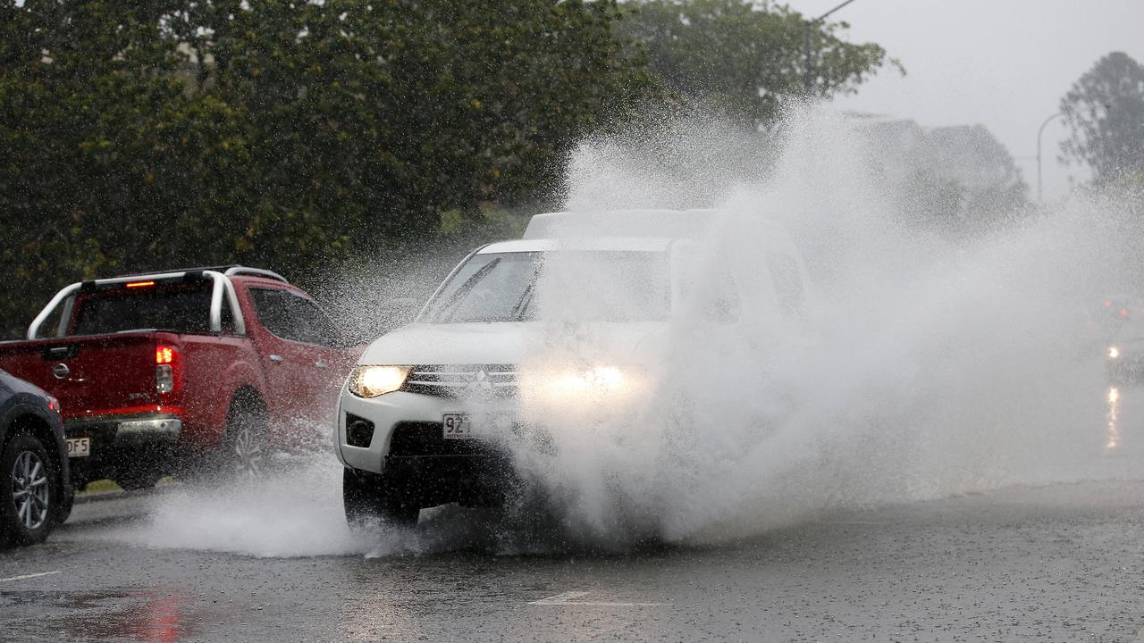 Traffic pictured driving through the heavy rain moving over Kangaroo Point, Brisbane, 14th February 2023. (Image/Josh Woning)