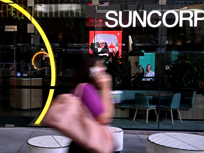 BRISBANE, AUSTRALIA - NewsWire Photos - FEBRUARY 20, 2024.People walk past a Suncorp BankÃs branch in Brisbane. A tribunal has authorised the $4.9 acquisition of SuncorpÃs banking arm by ANZ Bank. Picture: Dan Peled / NCA NewsWire