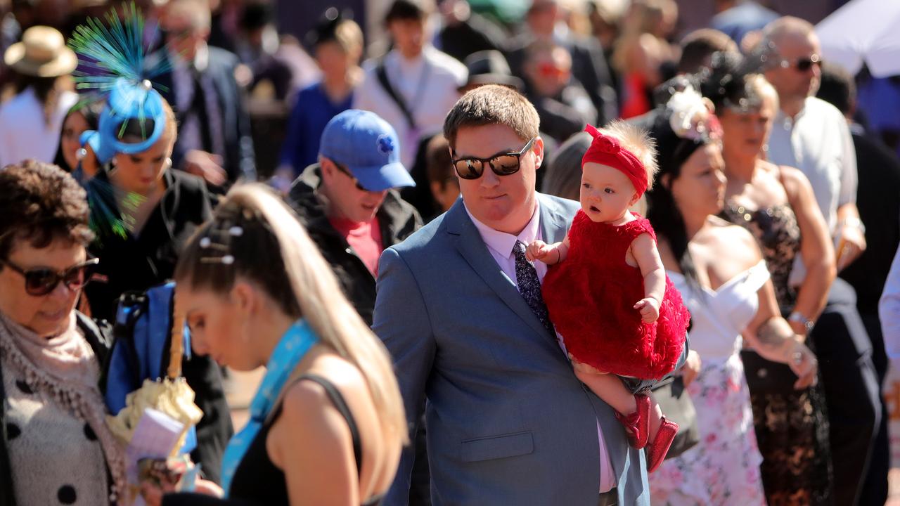 Crowds flock into Flemington. Picture: Stuart McEvoy