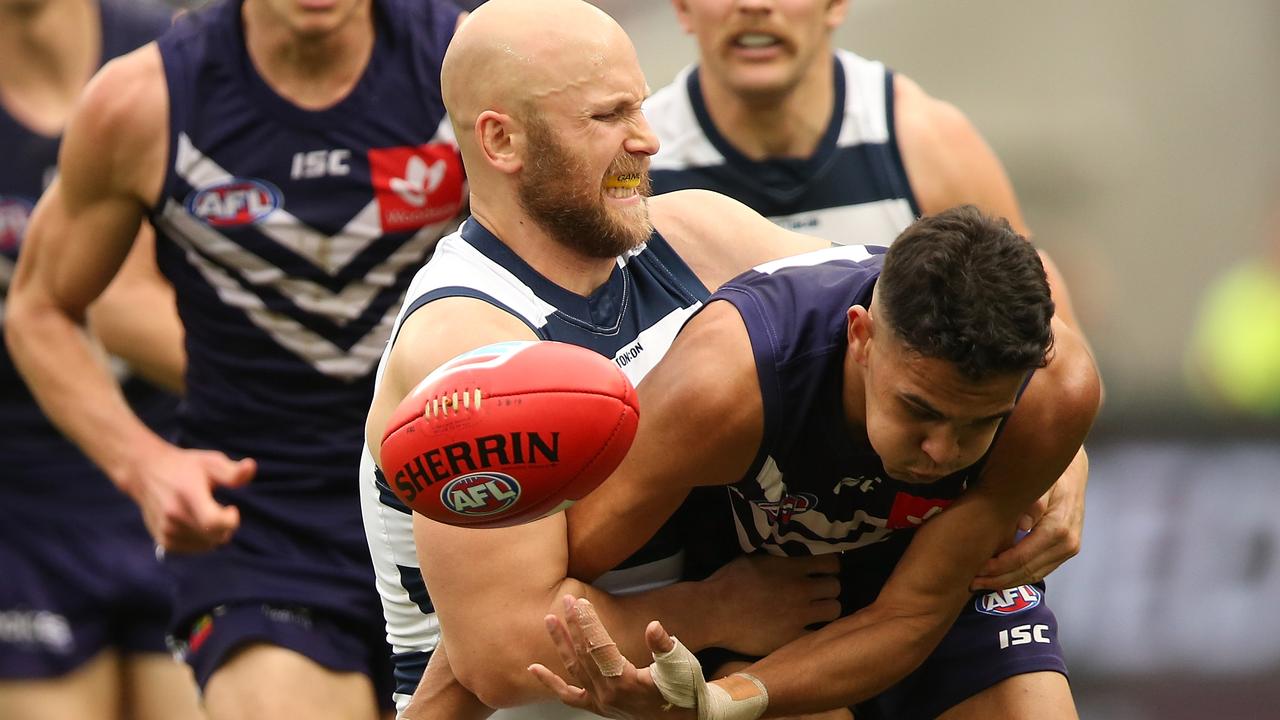 Cats superstar Gary Ablett disposses Jason Carter in a tackle: Picture: Getty Images