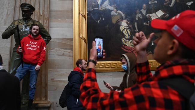 Supporters of President Donald Trump enter the US Capitol’s Rotunda, in Washington, on January 6, 2021. Picture: AFP