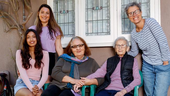 Maria Spathis, centre left, with her daughter Evonne and her granddaughter Maria Campo Romero and neighbours Aliki Coroneos, centre right and Chrysanthi Coroneos in Maroubra. Picture: Nikki Short