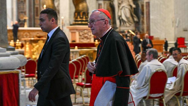 Italian cardinal and Vatican Secretary of State Pietro Parolin (2ndL) arrives at St Peter's Basilica prior to the start of the Eight Novemdiale mass, following the funeral of the pope and ahead of the conclave, in The Vatican. Picture; AFP.