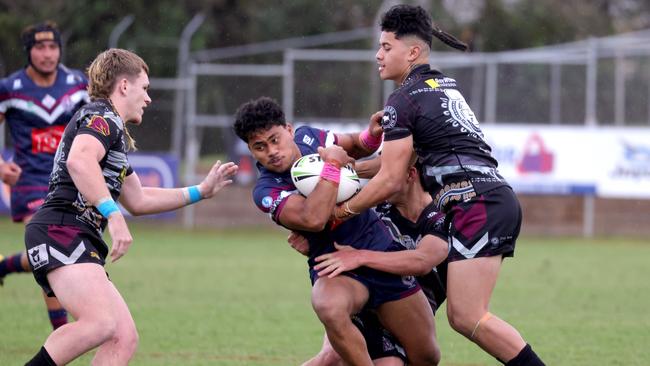 No.5 Saifiti SAIFITI with the ball from Ipswich SHS (blue) - Photo Steve Pohlner