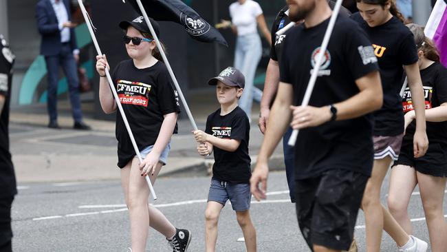 CFMEU workers and families pictured marching through the streets of Brisbane, 27th August 2024.