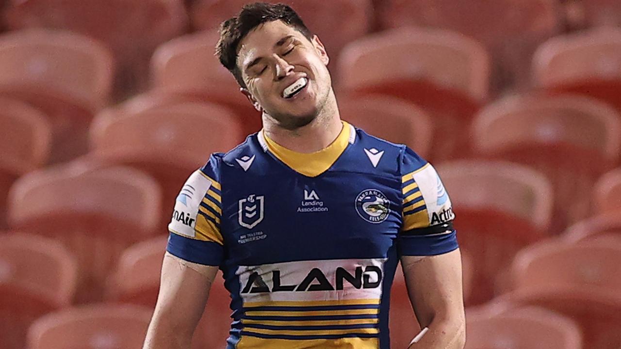 SYDNEY, AUSTRALIA - JULY 02: Mitchell Moses of the Eels reacts after missing a kick at goal during the round 16 NRL match between the Penrith Panthers and the Parramatta Eels at BlueBet Stadium on July 02, 2021, in Sydney, Australia. (Photo by Mark Kolbe/Getty Images)