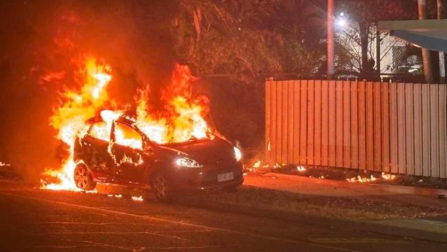 NT Police investigate a car fire in Woodroffe, Palmerston. Picture: Facebook // Mark Turner