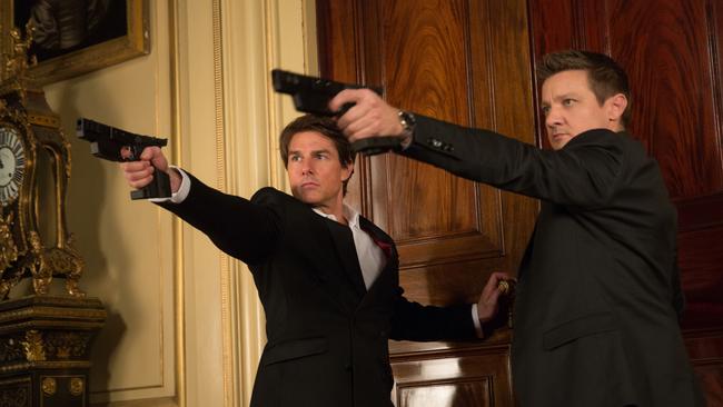 In this image released by Paramount Pictures, Tom Cruise, left, and Jeremy Renner appear in a scene from 