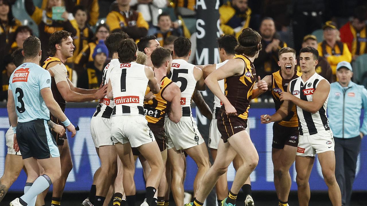 MELBOURNE, AUSTRALIA – AUGUST 05: Players melee after a goal to Nick Daicos of the Magpies (R) during the round 21 AFL match between Hawthorn Hawks and Collingwood Magpies at Melbourne Cricket Ground, on August 05, 2023, in Melbourne, Australia. (Photo by Daniel Pockett/Getty Images)