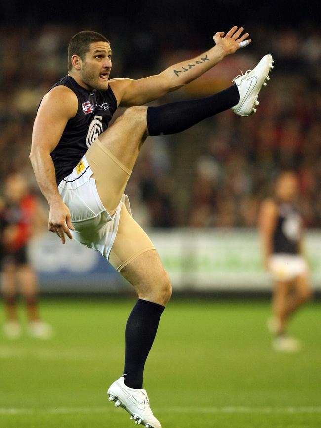 Fevola boots a goal for Carlton. 