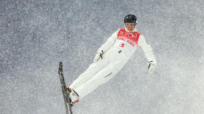 Laura Peel performs a trick on a practice run in shocking conditions. Picture: Getty