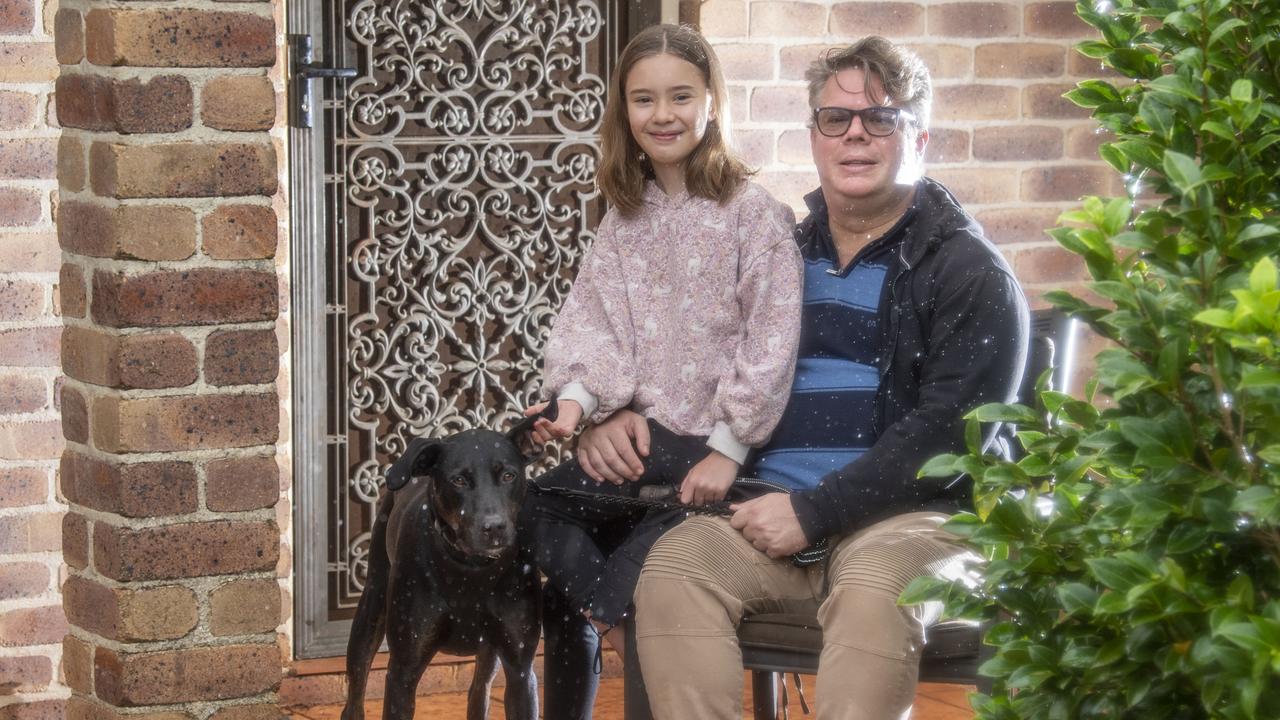 Thom Roker with his daughter Poppy-Jo Roker and dog Vincent. Picture: Nev Madsen.