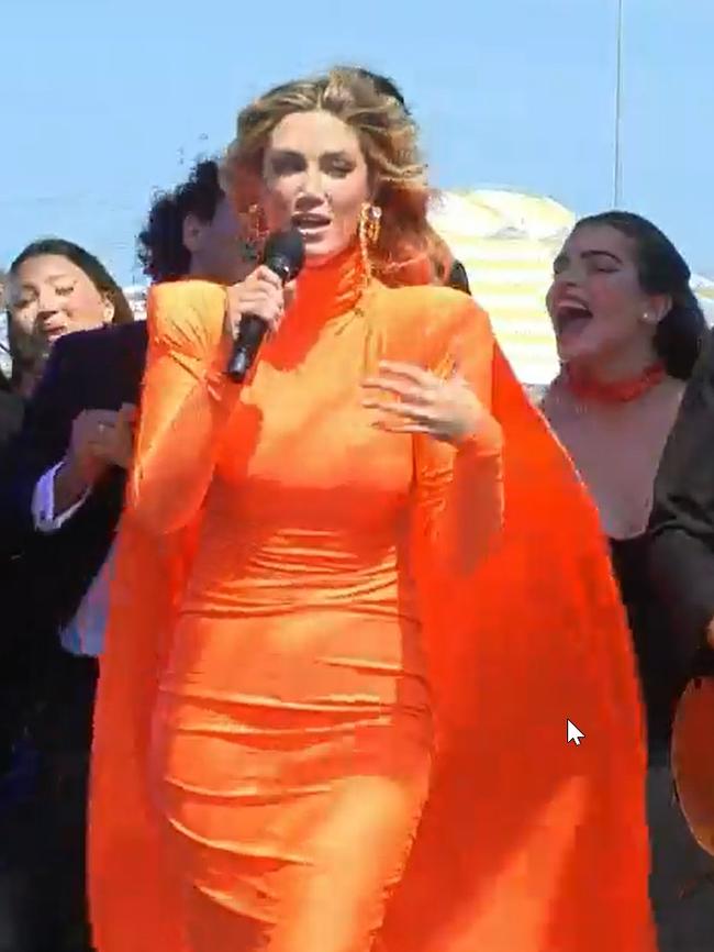 The singer changed into a billowing orange dress during her 2021 performance. Picture: Channel 10