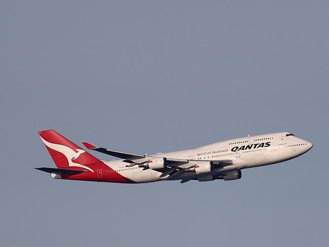 SYDNEY, AUSTRALIA - JULY 22: A Qantas Boeing 747-400, registration VH-OEJ,  passes over Sydney's Eastern Suburbs as it departs Sydney on its final flight on July 22, 2020 in Sydney, Australia. Qantas has farewelled the Boeing 747 jumbo jet from its fleet of aircraft, with the final 747-400 flight departing Sydney today. (Photo by Ryan Pierse/Getty Images)