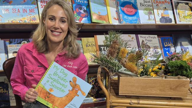 Karen McKinley in bookstore with her new children's book. Picture - contributed.