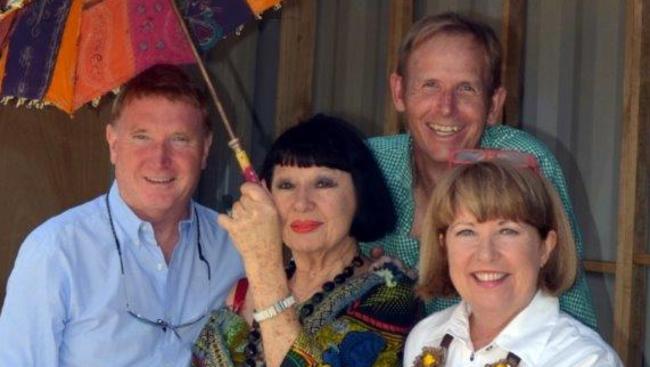 Eat Street founders Peter Hackworth (with umbrella), Jacki Macdonald, John Stainton and John Harrison (right).