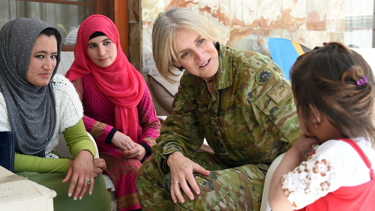 Australian Defence Force Brigadier Cheryl Pearce talks to orphanage staff and orphans during a visit to an Australian Embassy residence in Kabul in 2016. Picture: AAP