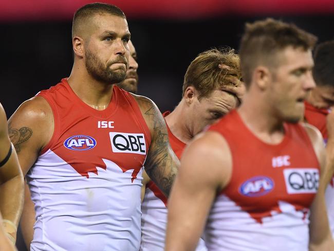 Lance Franklin of the Swans (centre) reacts after the Round 1 AFL match between the Western Bulldogs and the Sydney Swans at Marvel Stadium in Melbourne, Saturday, March 23, 2019. (AAP Image/Julian Smith) NO ARCHIVING, EDITORIAL USE ONLY