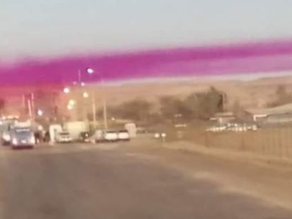 Mystery surrounds bizarre purple cloud