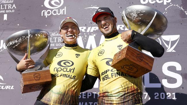 Carissa Moore and Gabriel Medina celebrate their world titles Picture: Getty Images