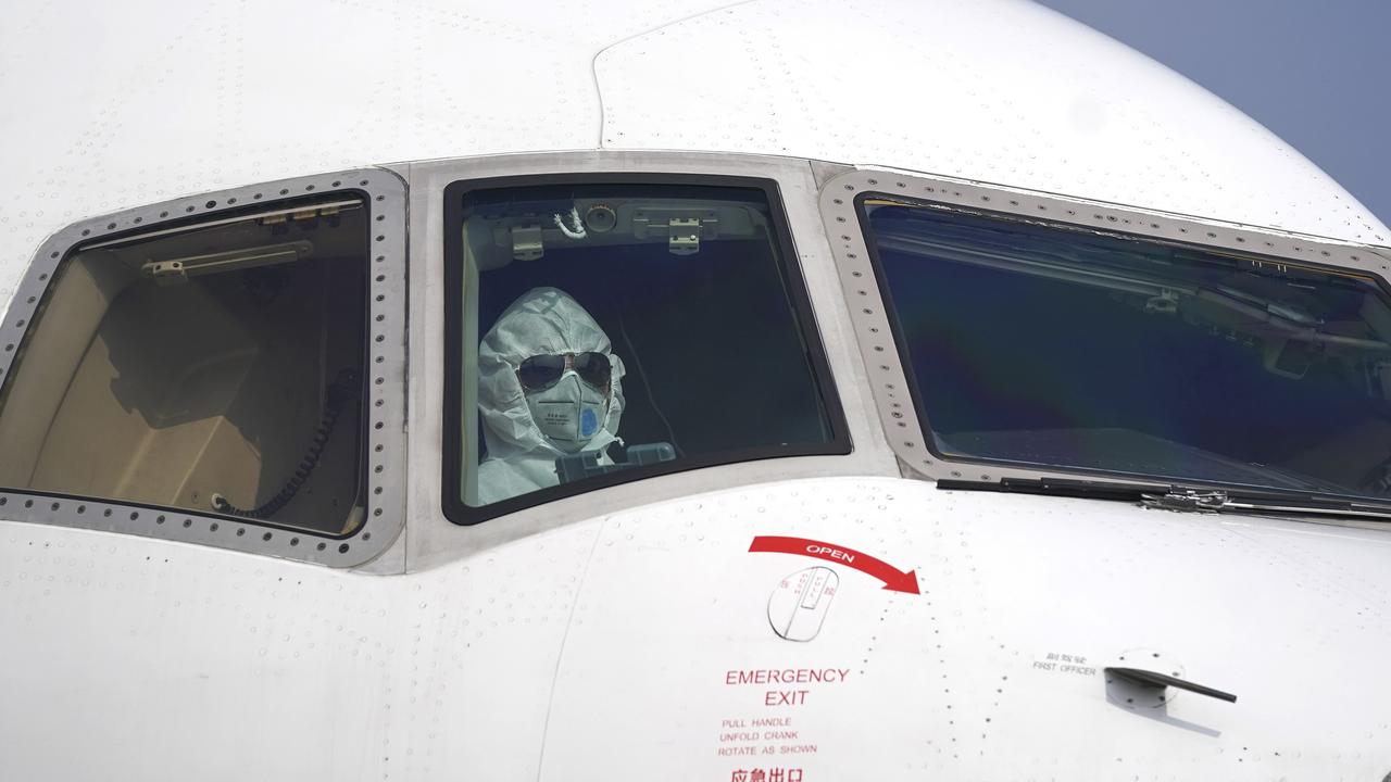 A cargo plane captain parks at Wuhan International Airport. Picture: Xinhua News Agency