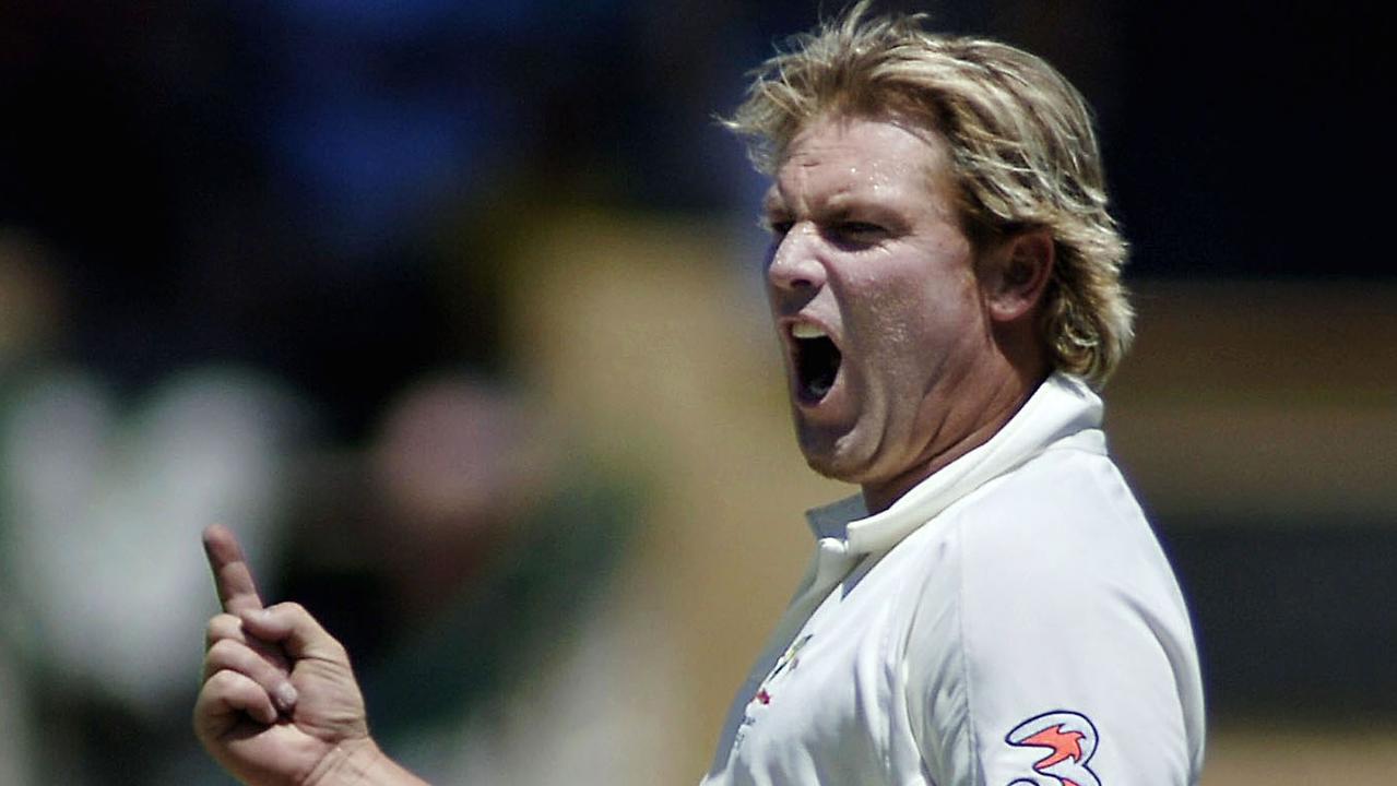 Shane Warne, bowling for Australia, celebrates after claimin