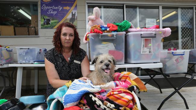 Cookie, the eight year old Silky Terrier cross, and Rachel Wills get ready to close the doors. Picture Glenn Hampson