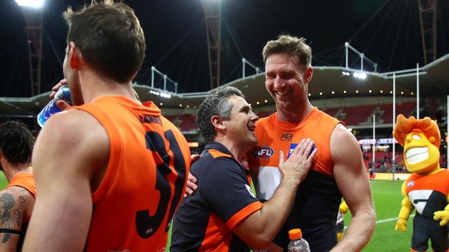 Leon Cameron celebrates with Dawson Simpson after the Giants’ win. Picture: Getty Images