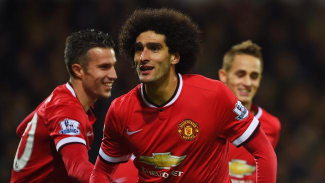 Marouane Fellaini of Manchester United celebrates with Robin van Persie.