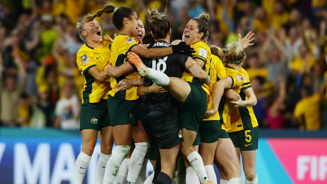 Matildas players celebrate winning the FIFA Women’s World Cup Quarter final match. Picture Lachie Millard