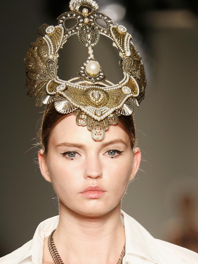 A model walks the runway for Ashlee Lauren at the New York Fashion Week.