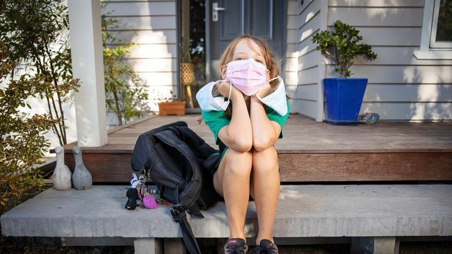 Grade 5 student Olivia wearing a face mask before the mandate was scrapped. Picture: Mark Stewart