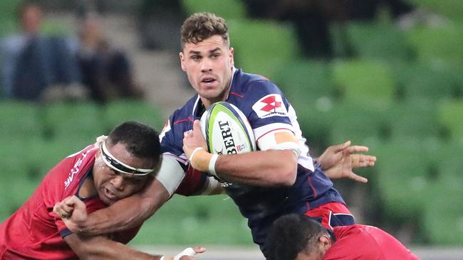 Tom English runs at the Queensland Reds defence last season.