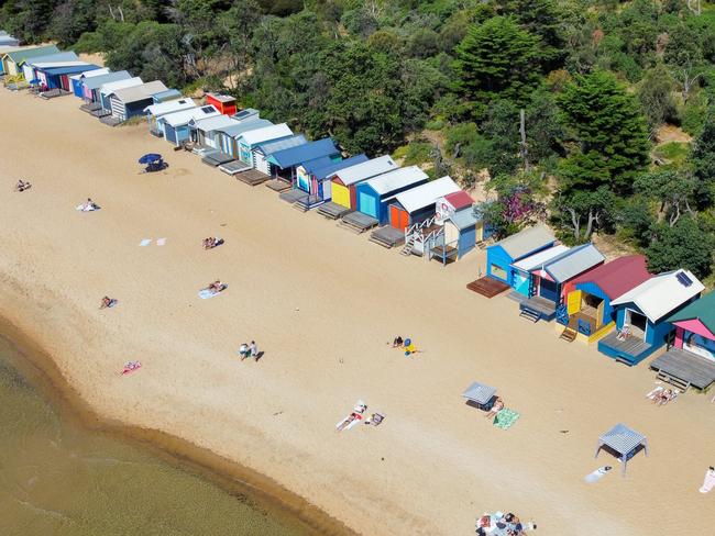 ESCAPE. Mornington Neighbourhood.  The bathing or beach boxes at Mills beach in Mornington, on the beautiful Mornington peninsula coast. Photo - istock