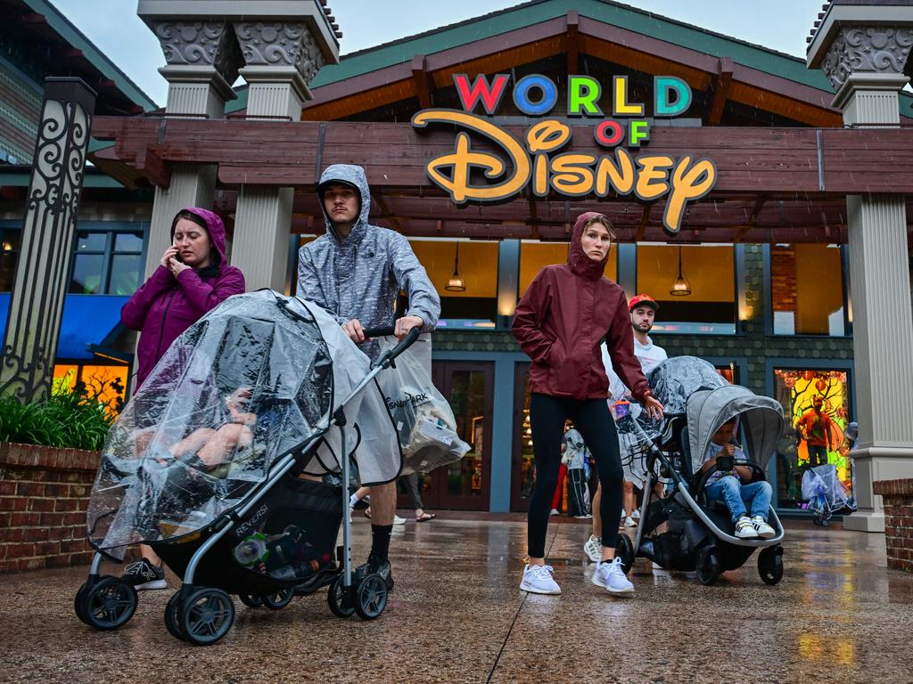 Visitors walk through the Disney Spring shopping centre in Orlando ahead of Hurricane Milton's landfall. Picture: Giorgio Viera / AFP