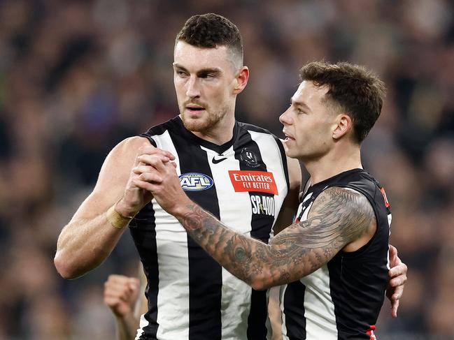 MELBOURNE, AUSTRALIA – AUG 03: Daniel McStay of the Magpies and Jamie Elliott of the Magpies (right) celebrate during the 2024 AFL Round 21 match between the Collingwood Magpies and the Carlton Blues at The Melbourne Cricket Ground on August 03, 2024 in Melbourne, Australia. (Photo by Michael Willson/AFL Photos via Getty Images)