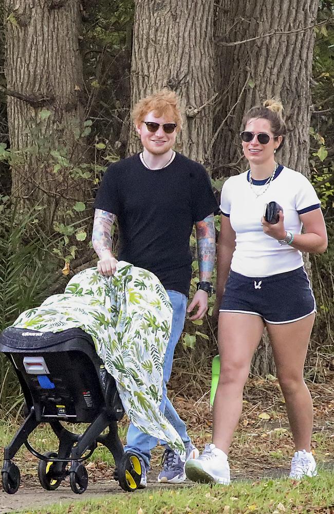 Ed Sheeran and wife Cherry Seaborn head out for a walk with their baby daughter Lyra. Picture: MEDIA-MODE.COM