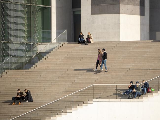 People sit outside during the second wave of the coronavirus pandemic in Berlin, Germany. Picture: Getty Images