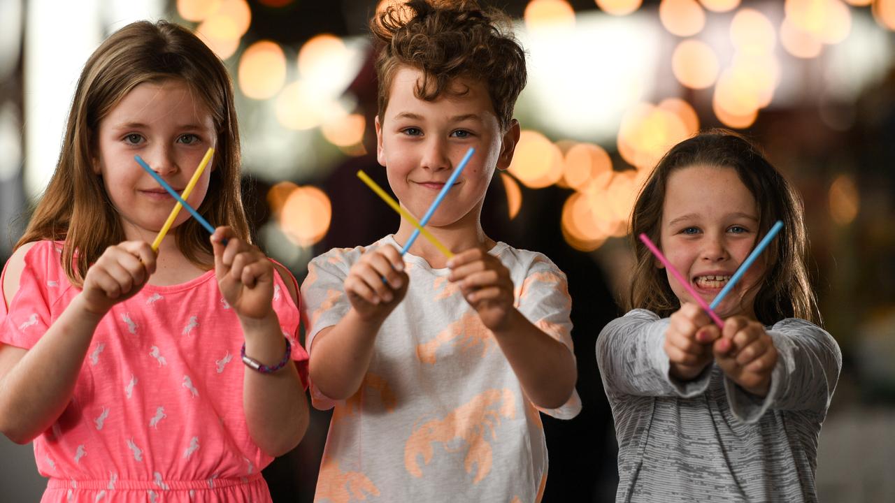 The South Melbourne Market banned straws from December 1, 2018. Arabella, 7, Hugo, 7, and Charley, 6, support the ban. Picture: Penny Stephens