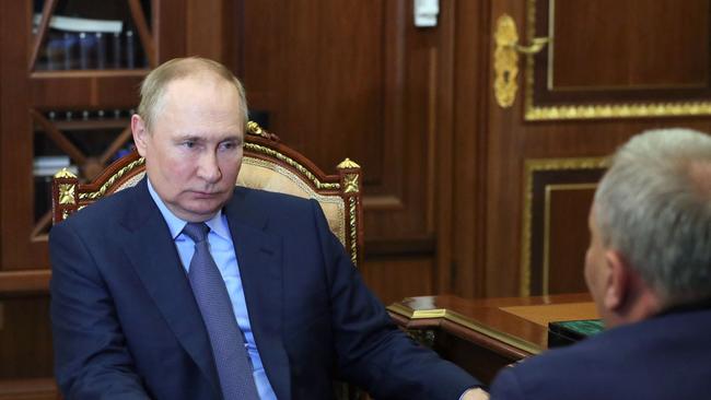 Russian President Vladimir Putin meets with Russia's space agency Roscosmos head Yury Borisov at the Kremlin. (Photo by Mikhail KLIMENTYEV / SPUTNIK / AFP)